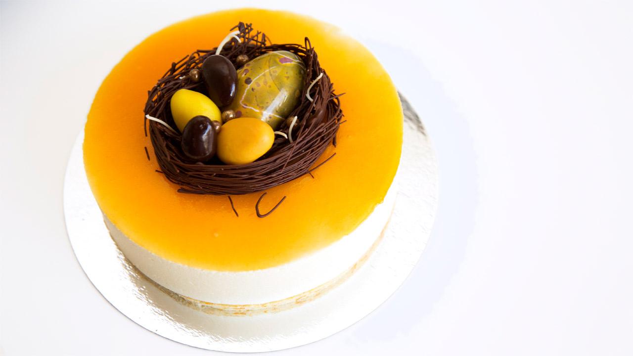 Gul ostekake med appelsinkrem og mandelbunn